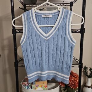 Light blue and white sweater vest